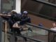 Police arrests a man climbing Trump Tower