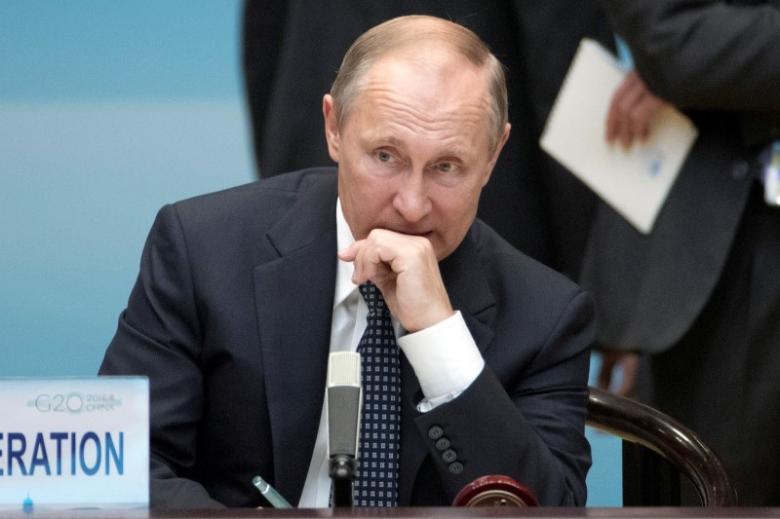 Putin says Russian economy stabilized pledges budget deficit cuts