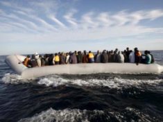 Rescuers pull 650 boat migrants to safety find 5 corpses Italy