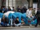 More migrants pitch tents on Paris streets as Calais camp shuts