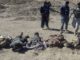 Ten bodies bearing signs of torture found in Libyas Benghazi official