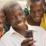 African children making phone call