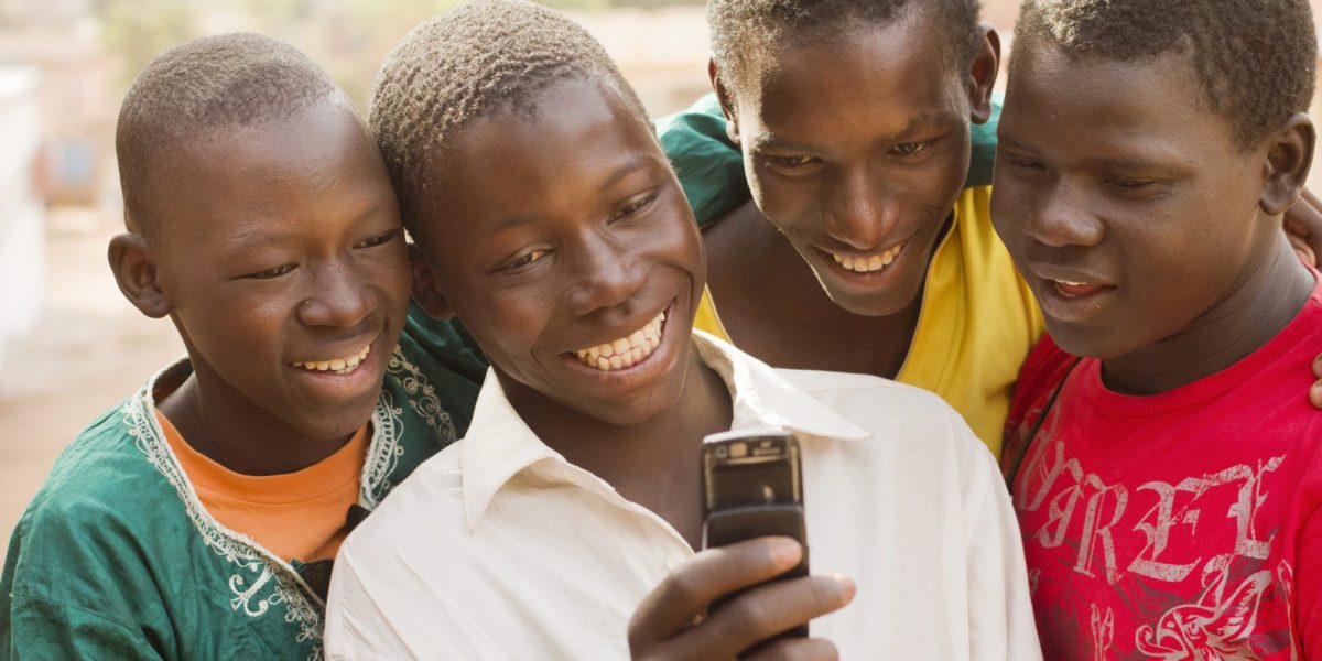African children making phone call