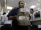 Egyptians prepare for further fall in floating pound