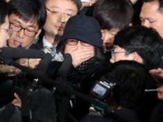 South Korean prosecutors arrest woman at centre of political crisis