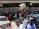 Zimbabwe police use water cannon against fake money protest