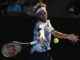 Federer wobbles but roars back to reach third round
