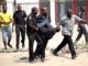 Nigerian policemen make an arrest