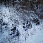South Korean U.S. Marines tussle in snow in what North brands madcap drill