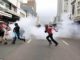 South African police fire tear gas to disperse anti immigrant protesters
