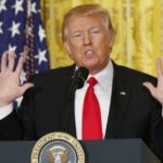 US President Trump reacts during news conference at the White House in Washington