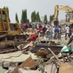 Buldozer at work during Port Harcourt market demolition