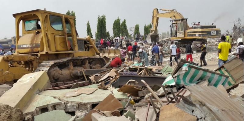 Buldozer at work during Port Harcourt market demolition