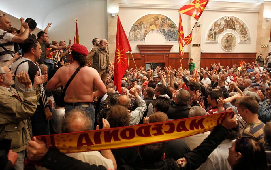 Lawmakers attacked as protesters storm Macedonian parliament
