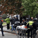 SYNAGOGUE SHOOTING LEAVES AT LEAST EIGHT DEAD