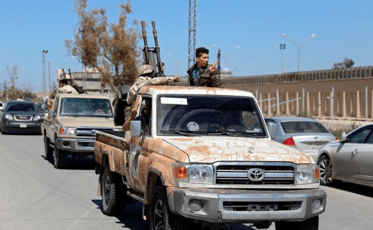 Military vehicles of Misrata forces, under the protection of Tripoli's forces, drive near a military camp in Tripoli, Libya April 9, 2019. REUTERS:Hani Amara