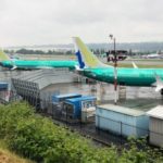 A row of three green 737 MAX jetliners sit parked on the tarmac at Renton Municipal Airport in Renton Washington US May 16 2019 REUTERS Eric Johnson