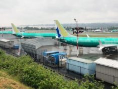 A row of three green 737 MAX jetliners sit parked on the tarmac at Renton Municipal Airport in Renton, Washington, U.S. May 16, 2019. REUTERS-Eric Johnson