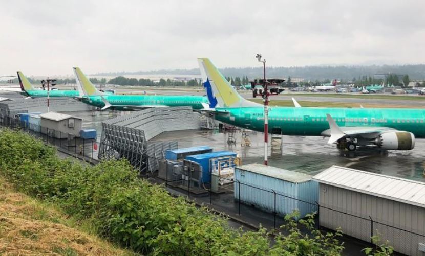 A row of three green 737 MAX jetliners sit parked on the tarmac at Renton Municipal Airport in Renton Washington US May 16 2019 REUTERS Eric Johnson