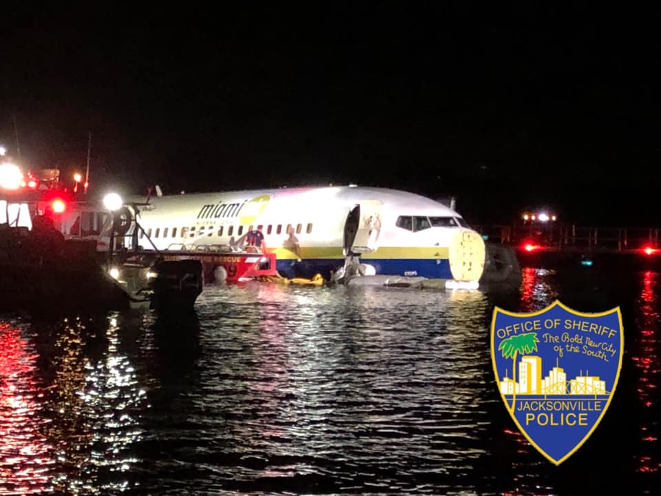 American Boeing 737 Plane Slides off Runway Into River 21 Passengers Injured