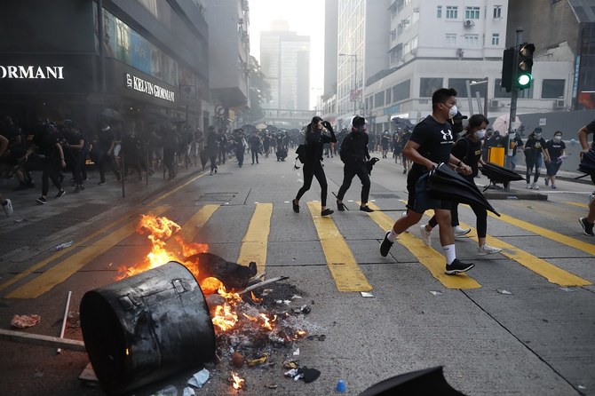 Streets of Hong Kong become protest battlefield on China National Day