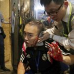 Hong Kong protests: Knife attacker bites man's ear after stabbing four