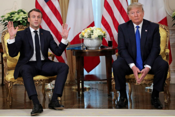 France's President Emmanuel Macron gestures during the meeting with U.S. President Donald Trump, ahead of the NATO summit in Watford, in London, Britain, December 3, 2019. Ludovic Marin/Pool via REUTERS