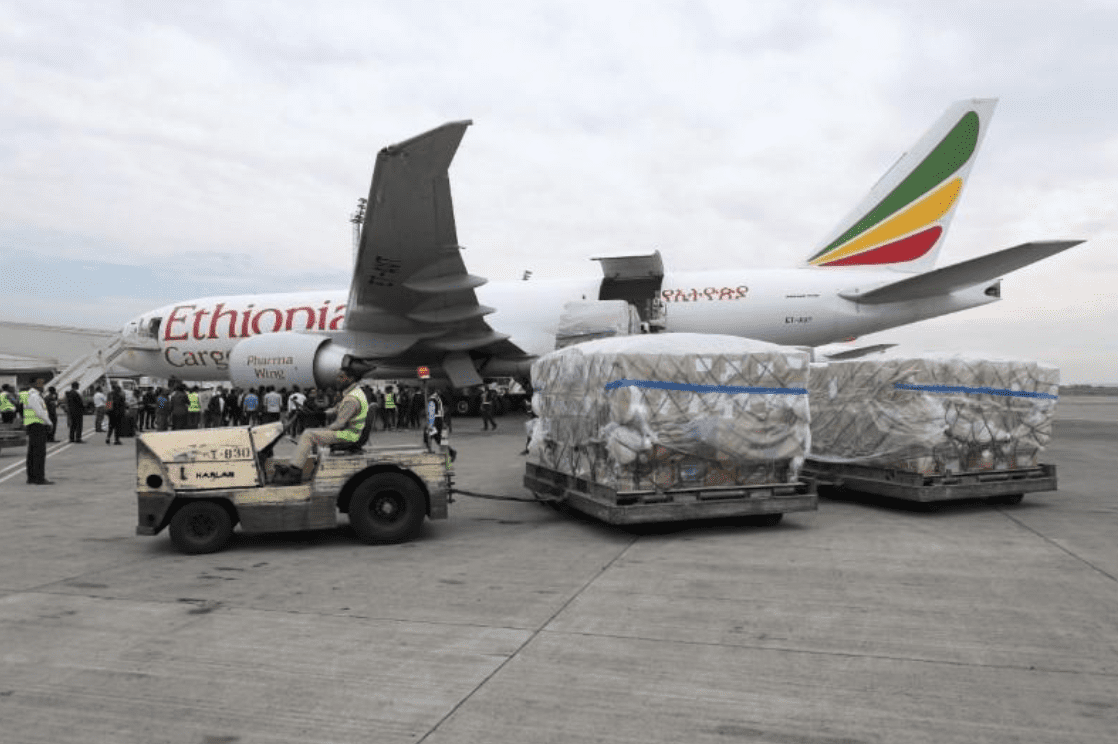 An Ethiopian Airlines worker transports a consignment of medical donation from Chinese billionaire Jack Ma and Alibaba Foundation to Africa for coronavirus disease