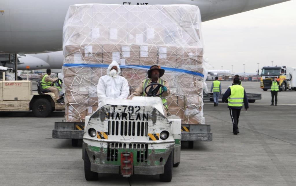 An Ethiopian Airlines worker transports a consignment of medical donation from Chinese billionaire Jack Ma and Alibaba Foundation to Africa for coronavirus disease