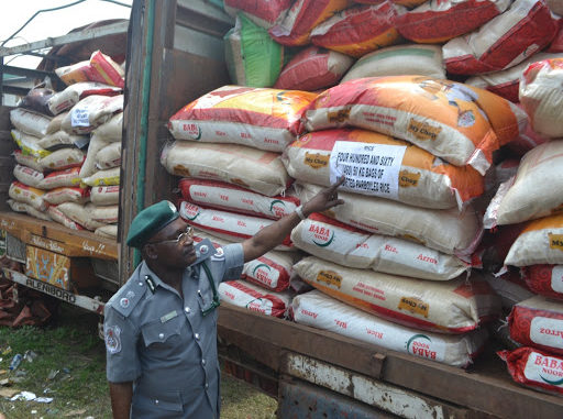 Buhari orders distribution of 150 truckloads of rice seized by customs to Nigerians