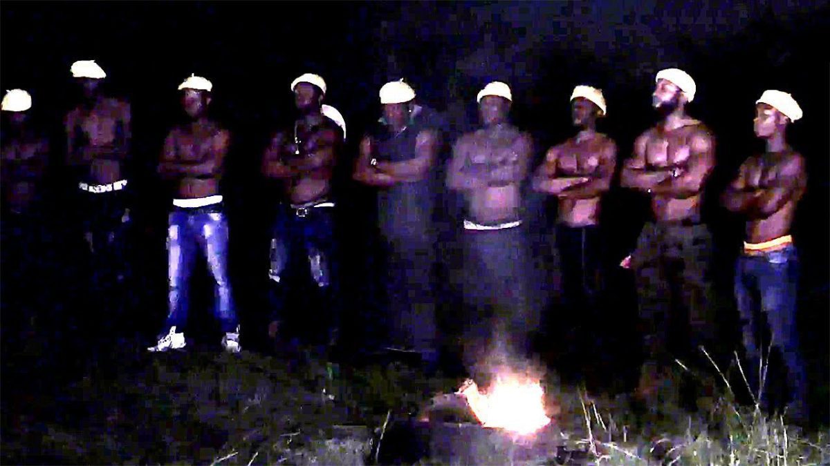 Cultists carrying out initiation