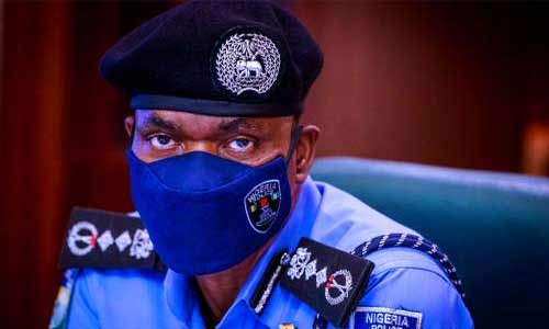 Inspector General of Police, IGP Mohammed Adamu wearing corona virus protection face masks