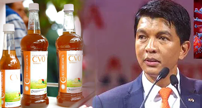 President Andry Rajoelina displaying Madagascar Corona virus Herbal Mixture