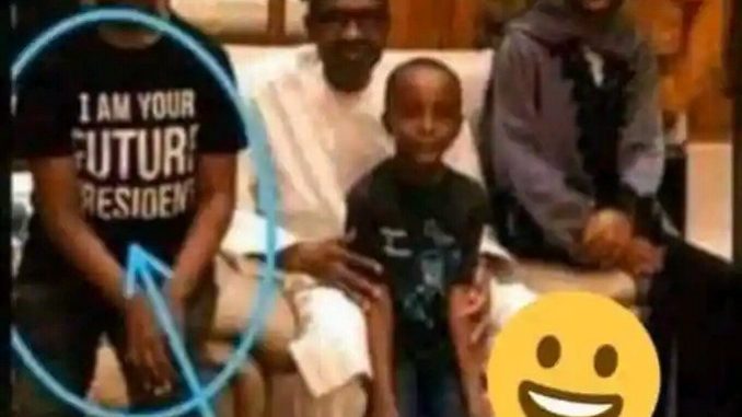 Wonder Shall Never End! See What Is Written On President Buhari’s Grandson Shirt That Got People Talking