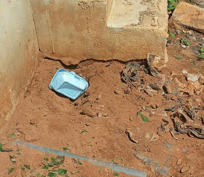 The shallow grave where the 33-year-old woman identified as Hauwa buried her baby alive
