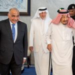 Iraqi PM Adel Abdul Mahdi walks with Saudi Arabia's King Salman bin Abdulaziz during meeting in Jeddah