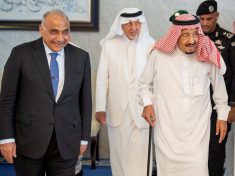 Iraqi PM Adel Abdul Mahdi walks with Saudi Arabia's King Salman bin Abdulaziz during meeting in Jeddah