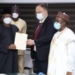 L R The HMH Dr Osagie Ehanire His Excellency Alexey Shebarshin and permanent Secretary A M Abdullah while presenting his document