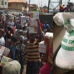 Hungry Nigerians Loot Palliatives in Government Warehouses