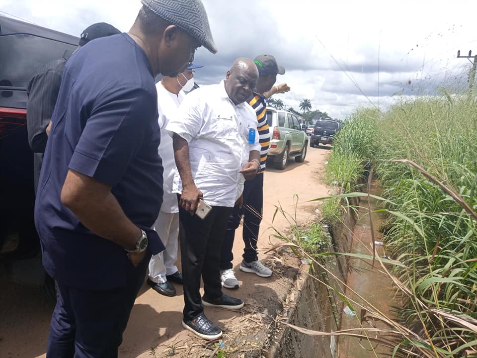 Imo state Minister of works Raph Nwosu inspecting a drainage system
