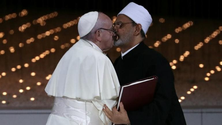 Pope Francis and Egyptian grand imam kiss