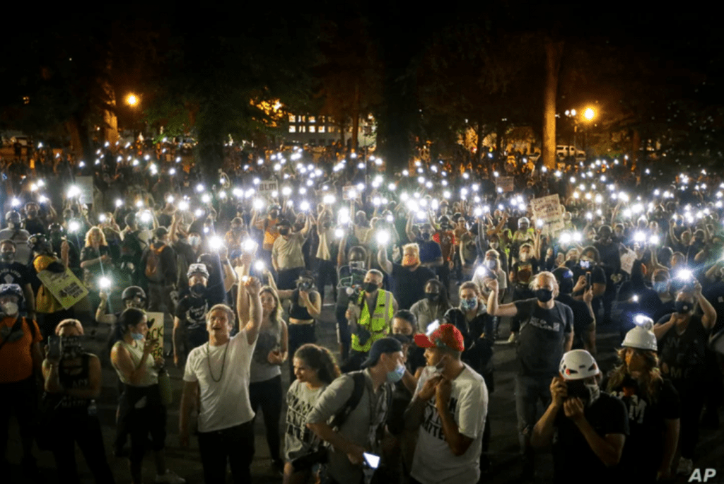 Demonstrators chant slogans during a Black Lives Matter protest at the Mark O. Hatfield United States Courthouse, July 29, 2020, in Portland, Oregon