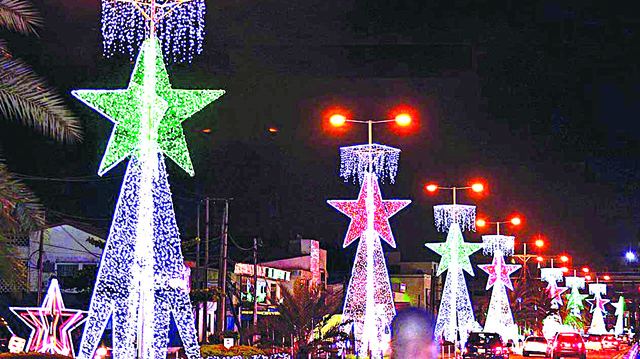 Star lights decorate a commercial street at Christmas in Lagos Nigeria - 9News Nigeria