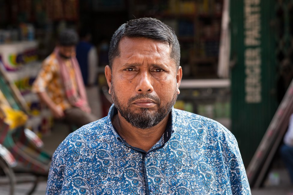 image captionAli Hossain and his father searched Dhaka for his brother's body