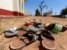 FILE PHOTO: A collection of student footwears left behind after gunmen abducted students at the Government Science school in Kankara