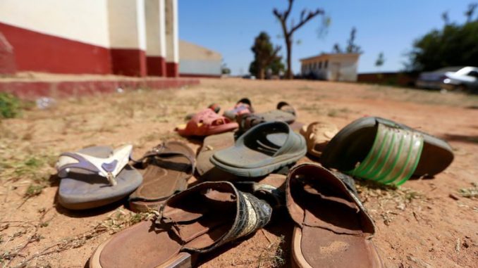 FILE PHOTO: A collection of student footwears left behind after gunmen abducted students at the Government Science school in Kankara