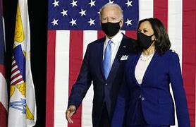 BIDEN AND WIFE