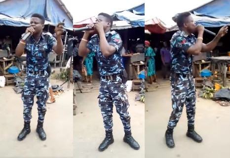 Nigerian Police Officer In Uniform Spotted Preaching At A Market (video)