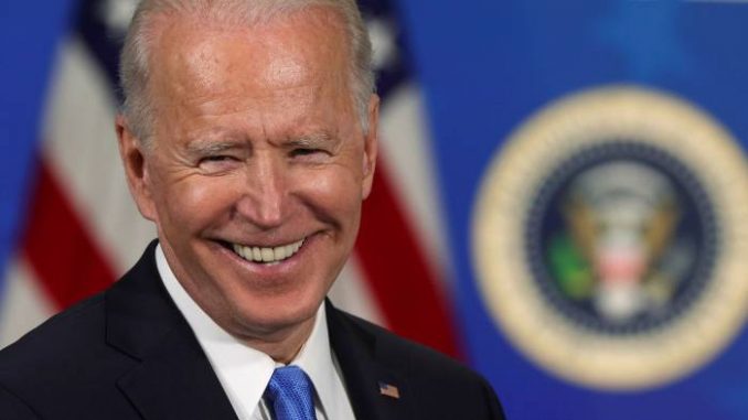 First Payments Of Biden's $1.9 Trillion Stimulus Package To Hit Bank Accounts This Weekend - Officials