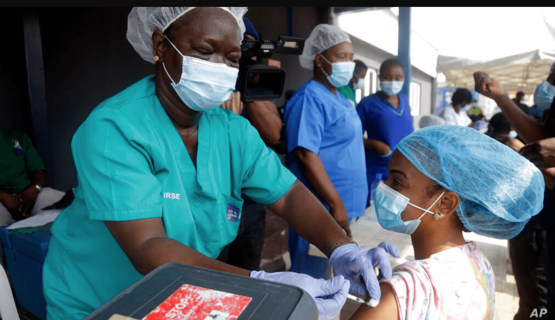 Hospital staff receives one of Nigerias first coronavirus vaccinations using AstraZeneca COVID 19 vaccine manufactured by the Serum Institute of India and provided through the global COVAX initiative at Yaba Mainland hospital in Lagos March 12 2021